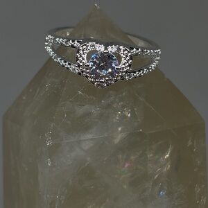 Sterling Silver Ring w/ Round CZ Center Stone and Pave’ Accent Heart Band